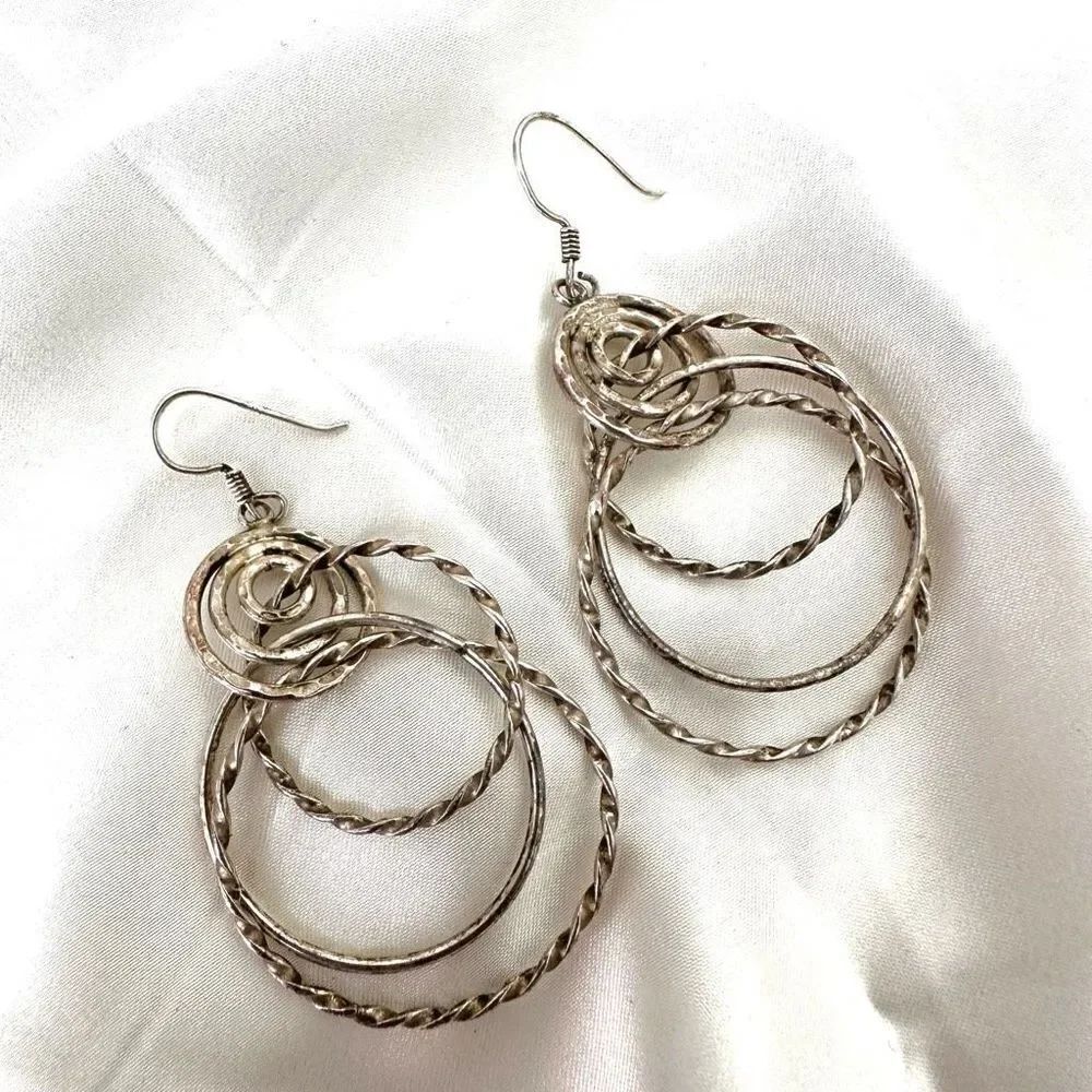 Silver tone multi circle dangling earrings